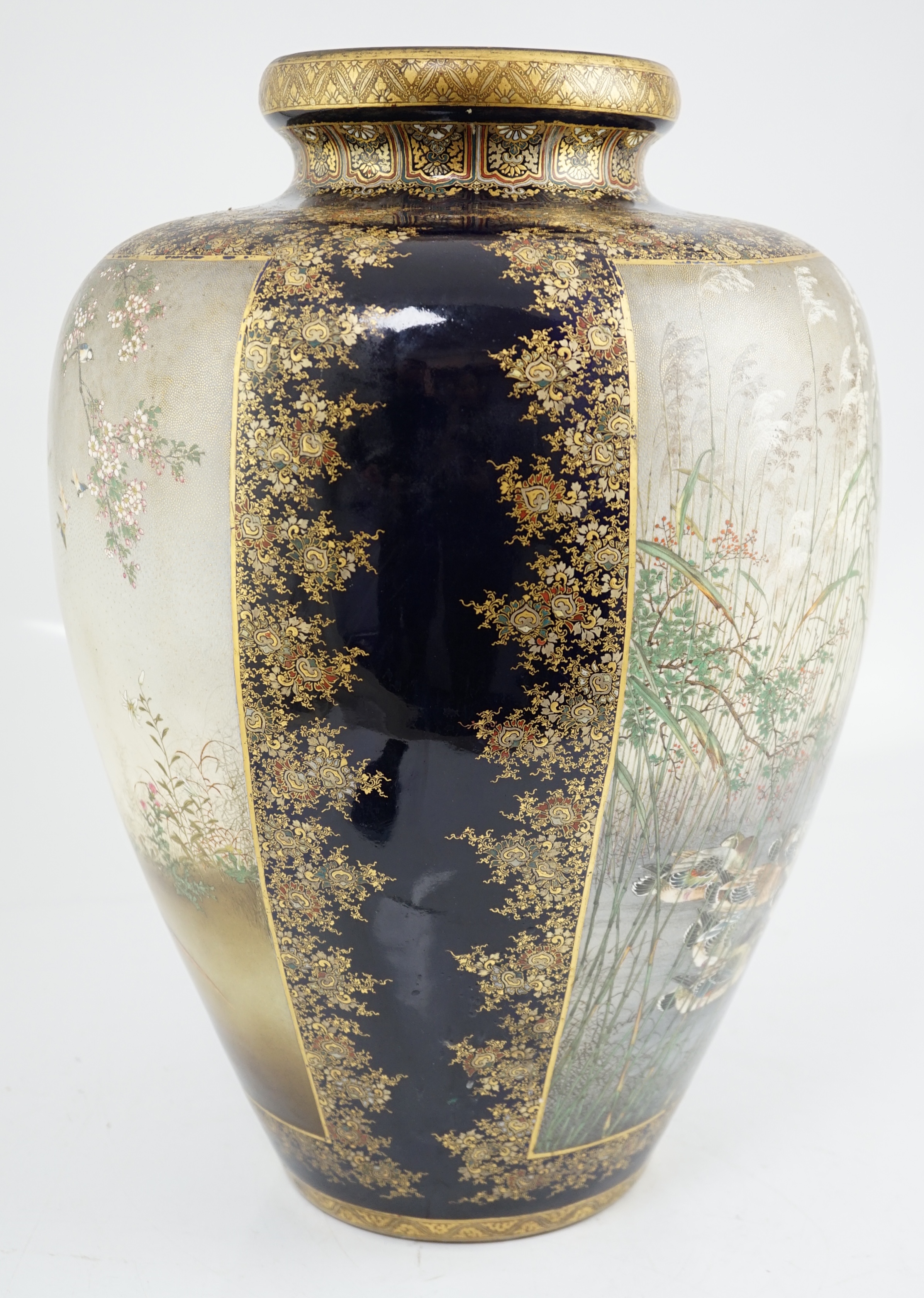 An exhibition size Japanese Satsuma pottery vase, by Kinkozan, Meiji period, star crack to one side